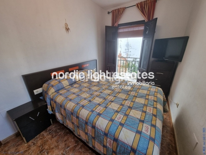 Apartment with exceptional outdoor areas in the center of Frigiliana