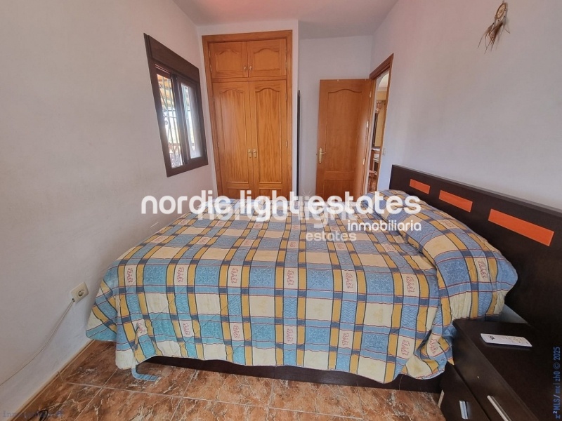 Apartment with exceptional outdoor areas in the center of Frigiliana