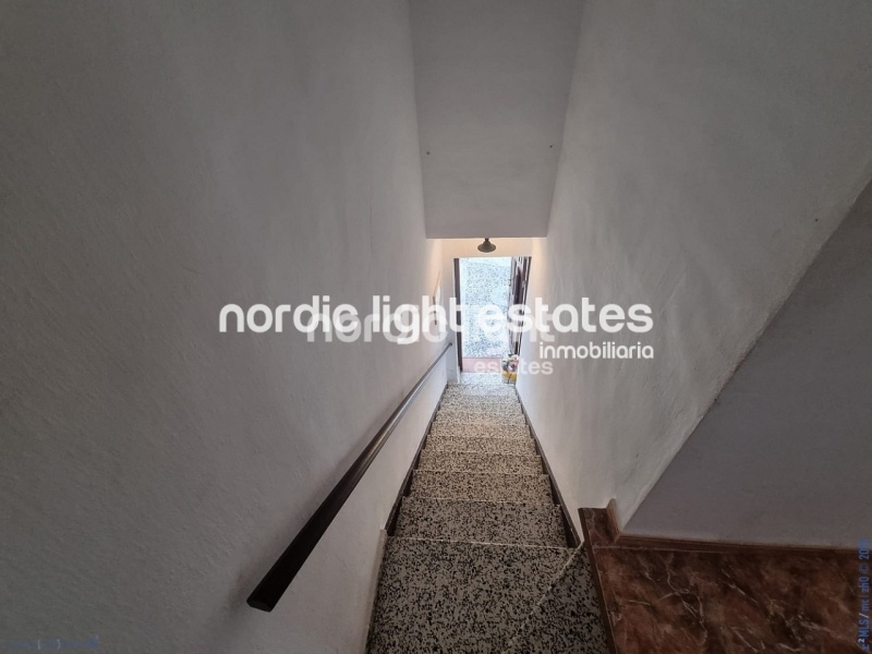 Apartment with exceptional outdoor areas in the center of Frigiliana