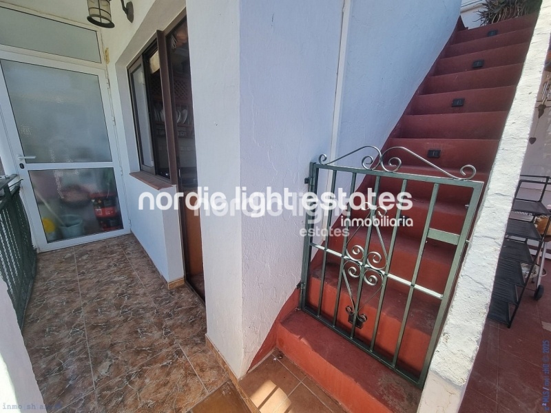 Apartment with exceptional outdoor areas in the center of Frigiliana