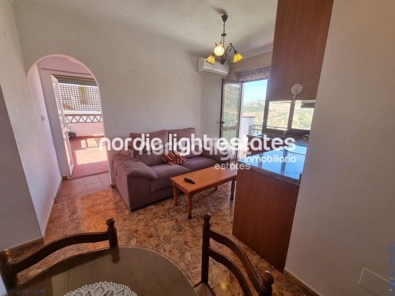 Apartment with exceptional outdoor areas in the center of Frigiliana