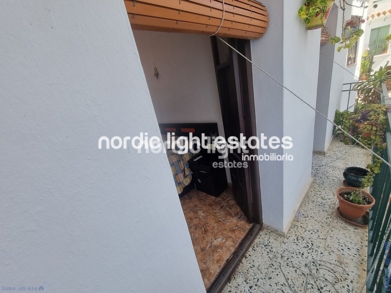 Apartment with exceptional outdoor areas in the center of Frigiliana