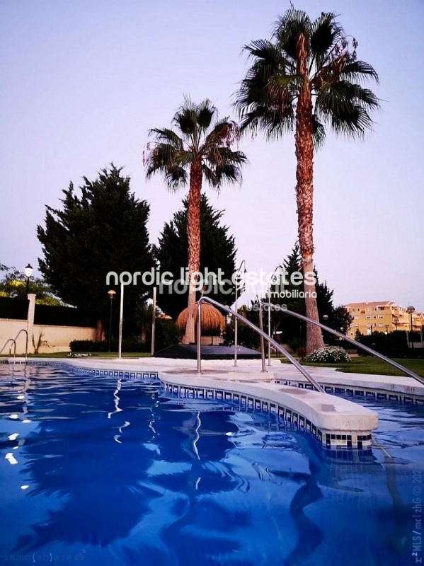 Magnificent corner apartment in Algarrobo Costa. Store room and parking space 