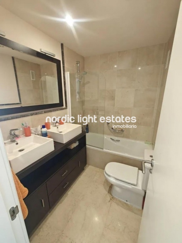Luxury apartment in the prestigious Calaceite Urbanisation in Torrox Costa. Swimming pool and parking space x 