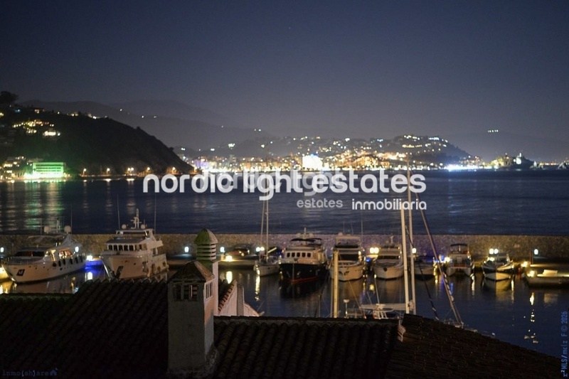 Impressive house with harbour views and several garages