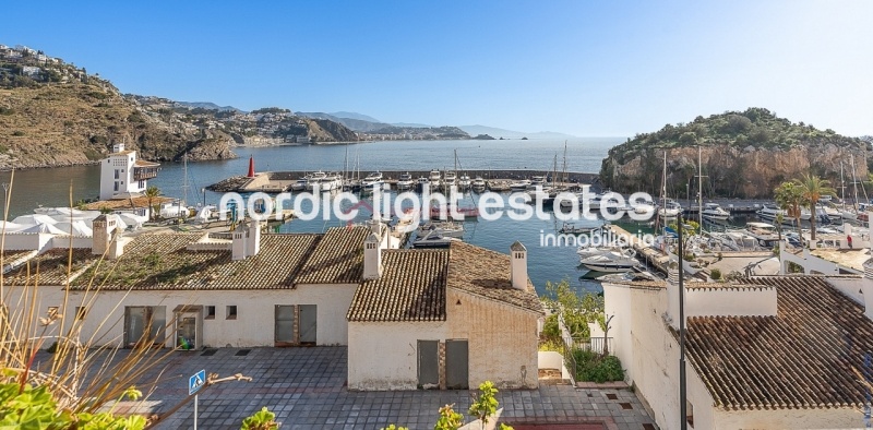 Impressive house with harbour views and several garages