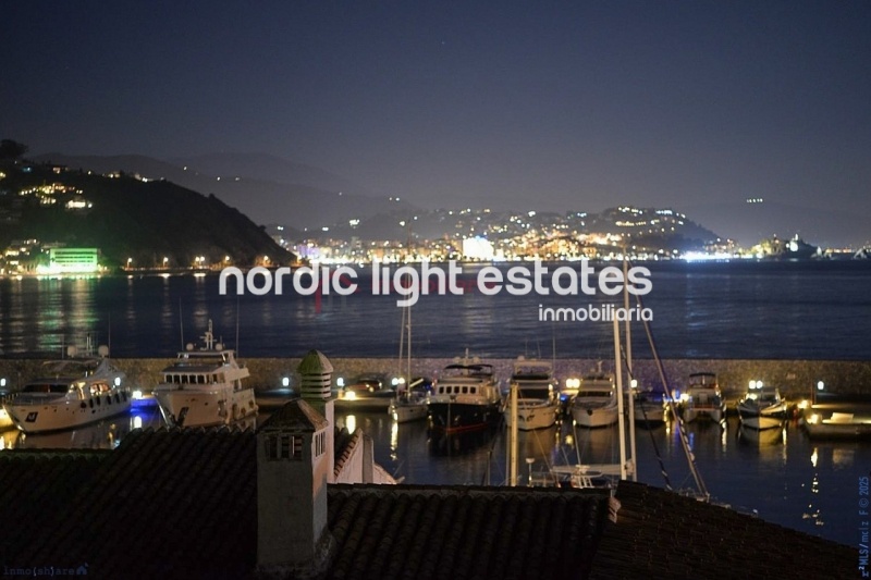 Impressive house with harbour views and several garages