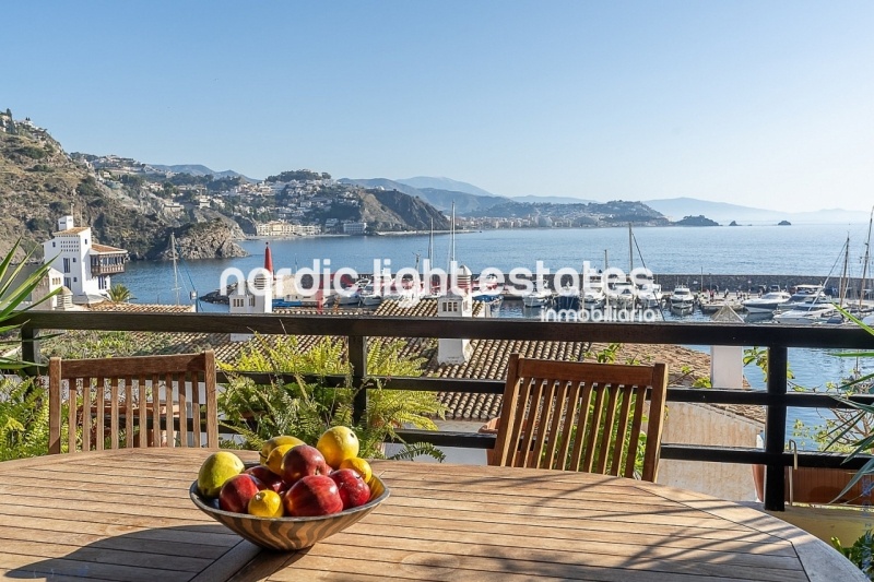 Impressive house with harbour views and several garages