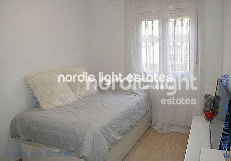 Bonita casa adosada en una urbanización