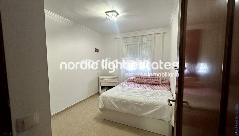 Bonita casa adosada en una urbanización