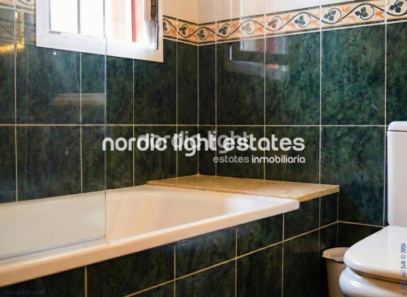 Bonita casa adosada en una urbanización