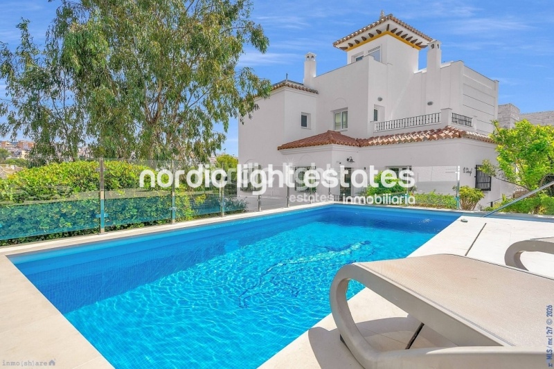 Contemporary luxury villa with several lounges 