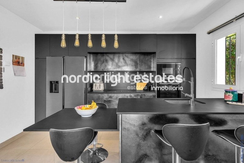 Contemporary luxury villa with several lounges 