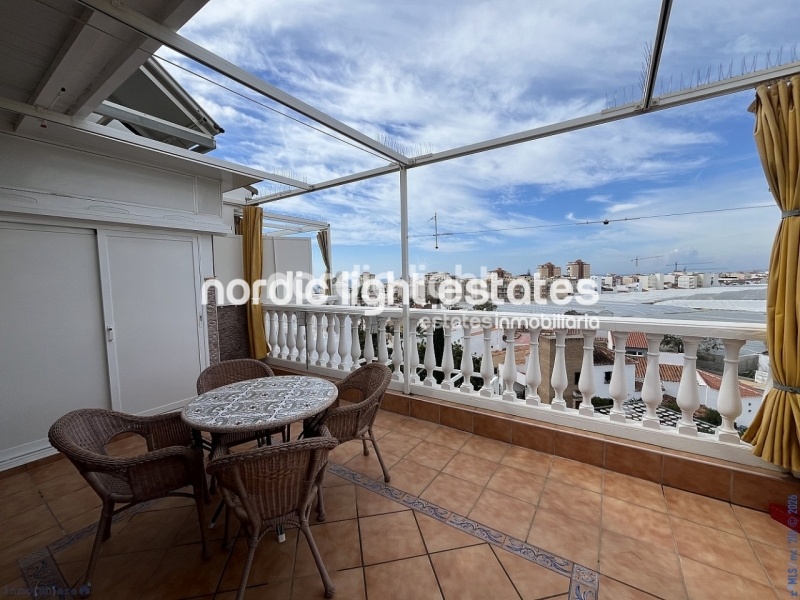 Acogedor ático con gran terraza y cochera