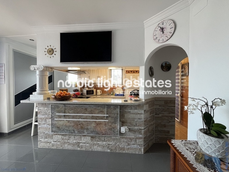 Acogedor ático con gran terraza y cochera