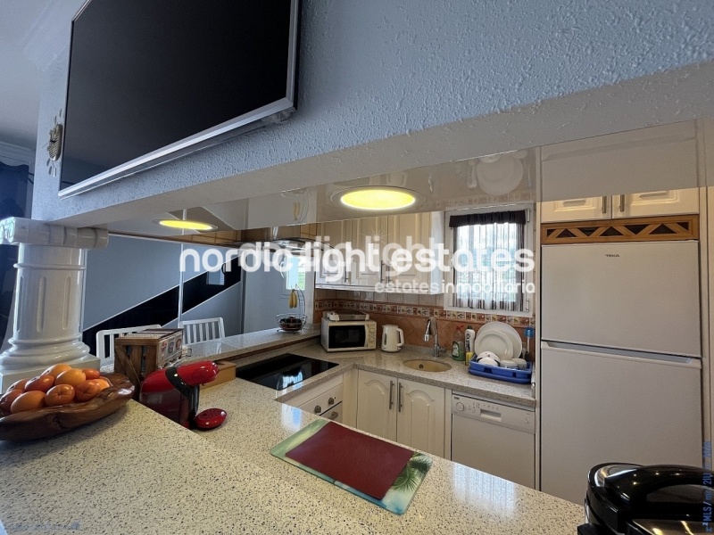 Acogedor ático con gran terraza y cochera