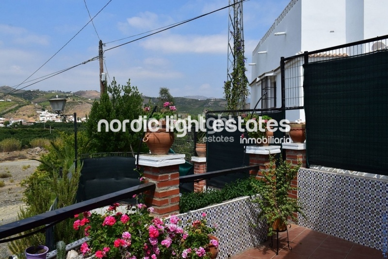 Casa de pueblo independiente con muchas características originales 