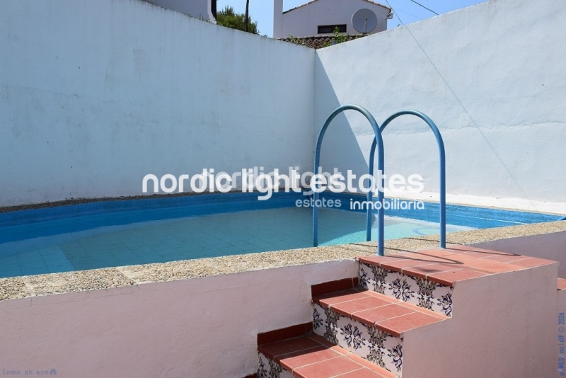 Casa de pueblo independiente con muchas características originales 