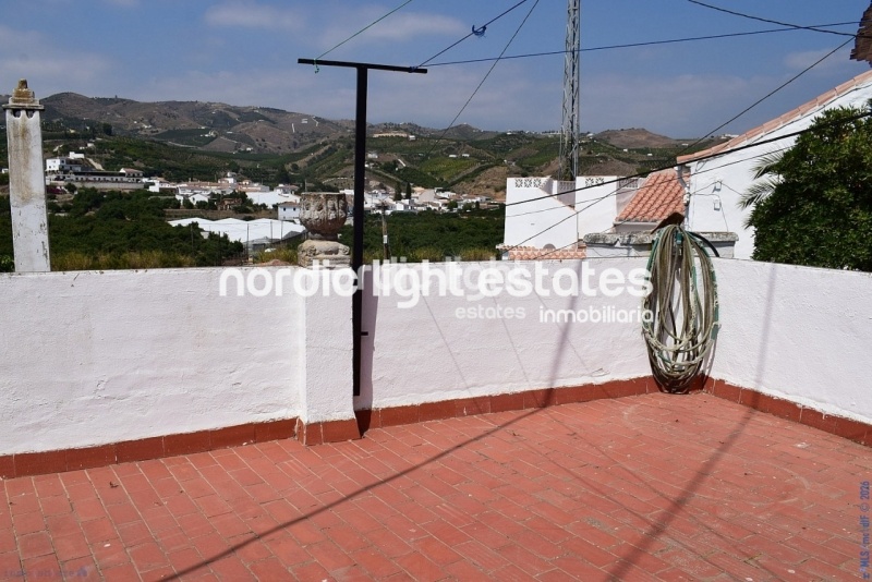 Casa de pueblo independiente con muchas características originales 