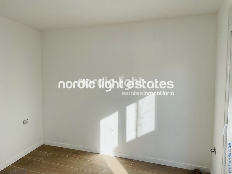 Moderna casa de obra nueva en el centro