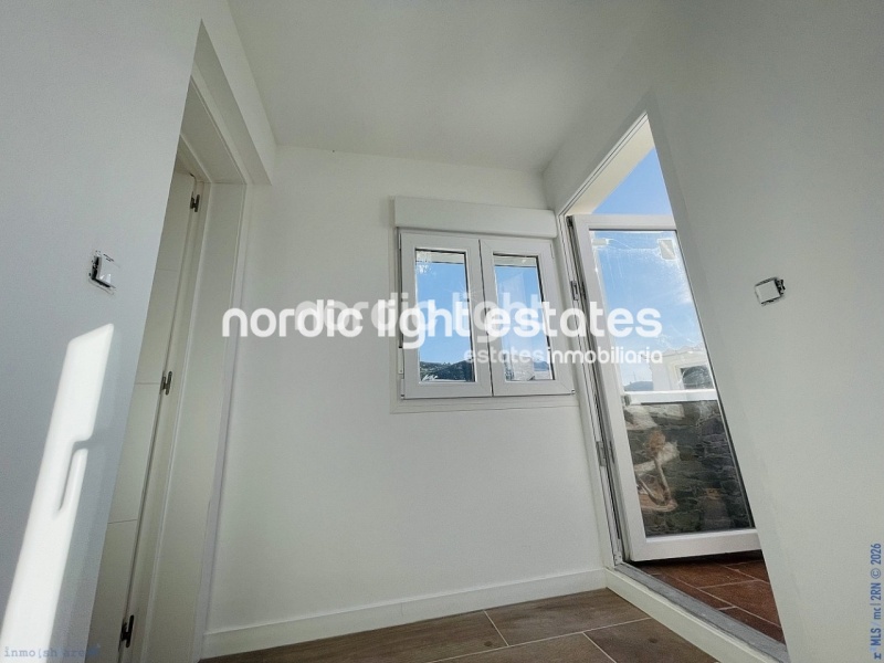 Moderna casa de obra nueva en el centro