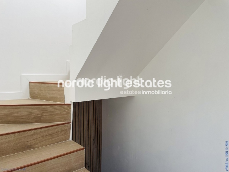 Moderna casa de obra nueva en el centro