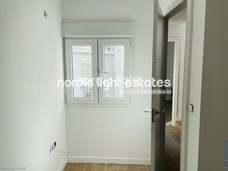 Moderna casa de obra nueva en el centro