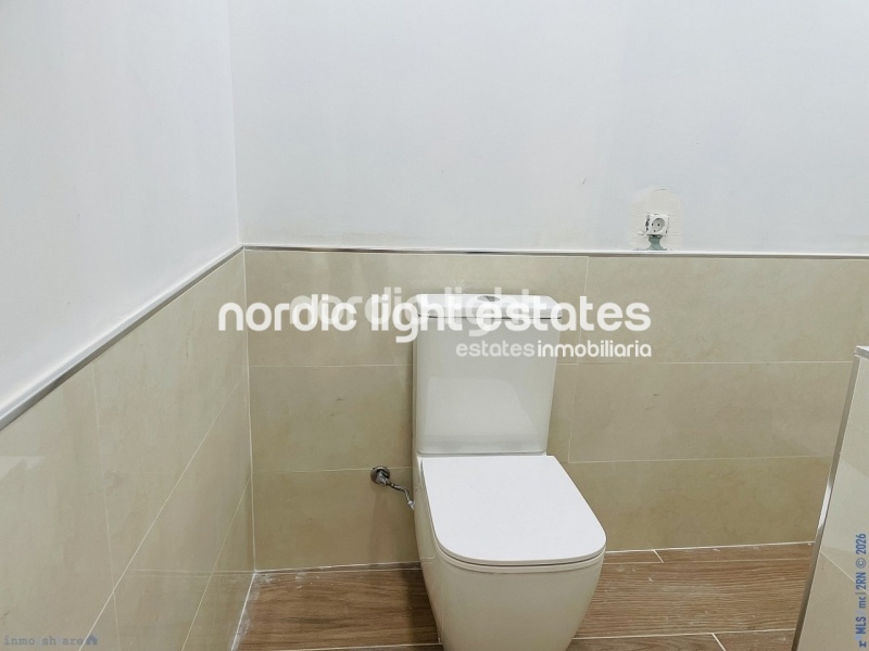 Moderna casa de obra nueva en el centro