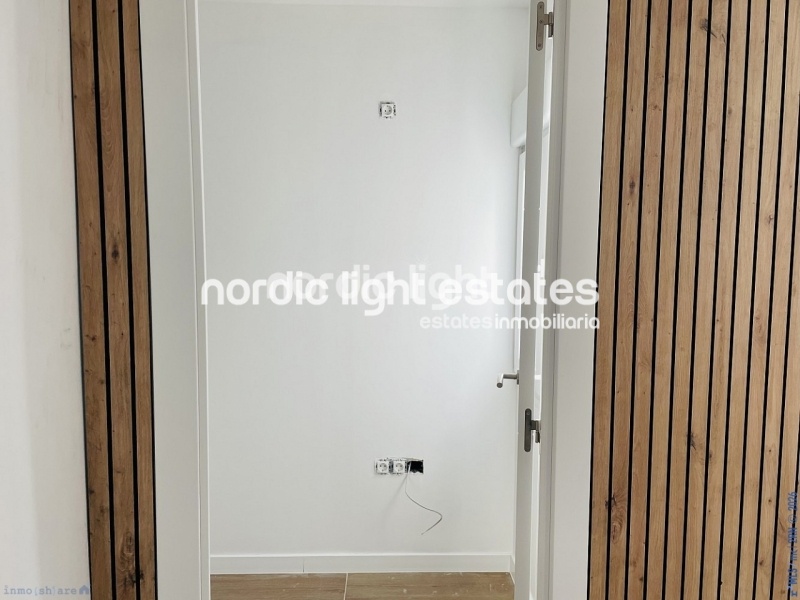 Moderna casa de obra nueva en el centro