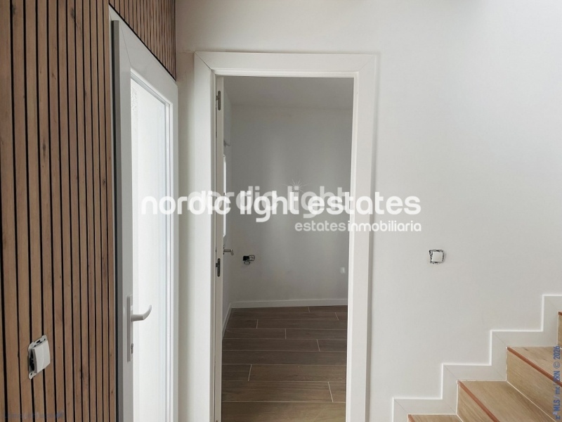 Moderna casa de obra nueva en el centro