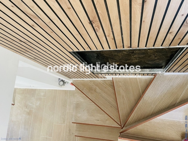 Moderna casa de obra nueva en el centro