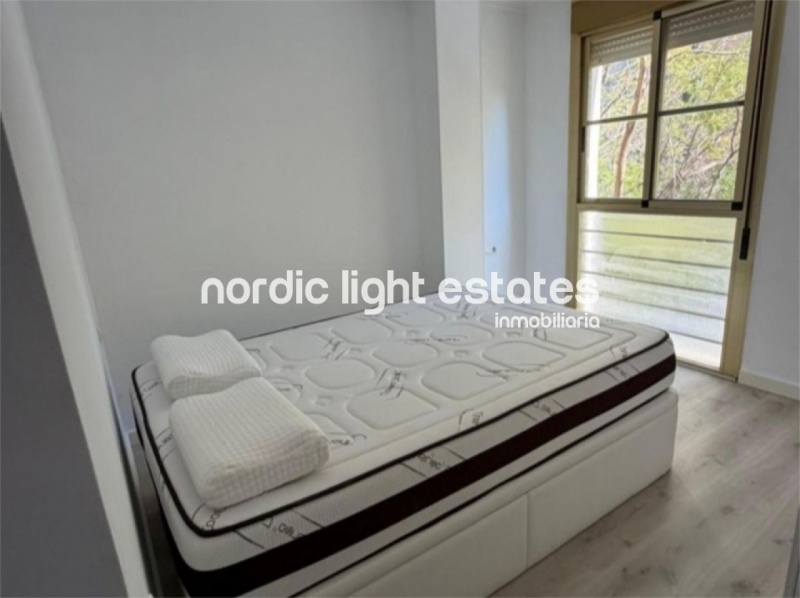 Bright and spacious apartment with parking space