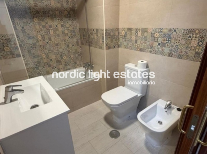 Bright and spacious apartment with parking space