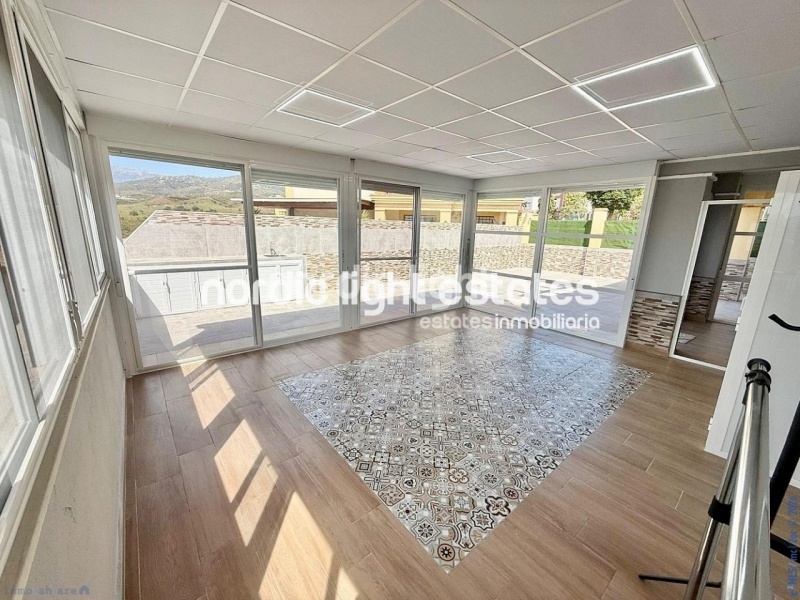 Elegante apartamento de esquina con terraza de 100m2