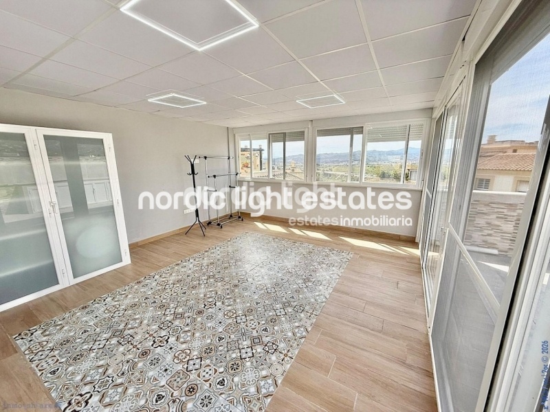 Elegante apartamento de esquina con terraza de 100m2