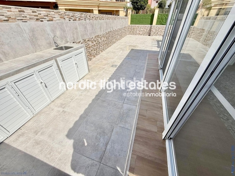 Elegante apartamento de esquina con terraza de 100m2