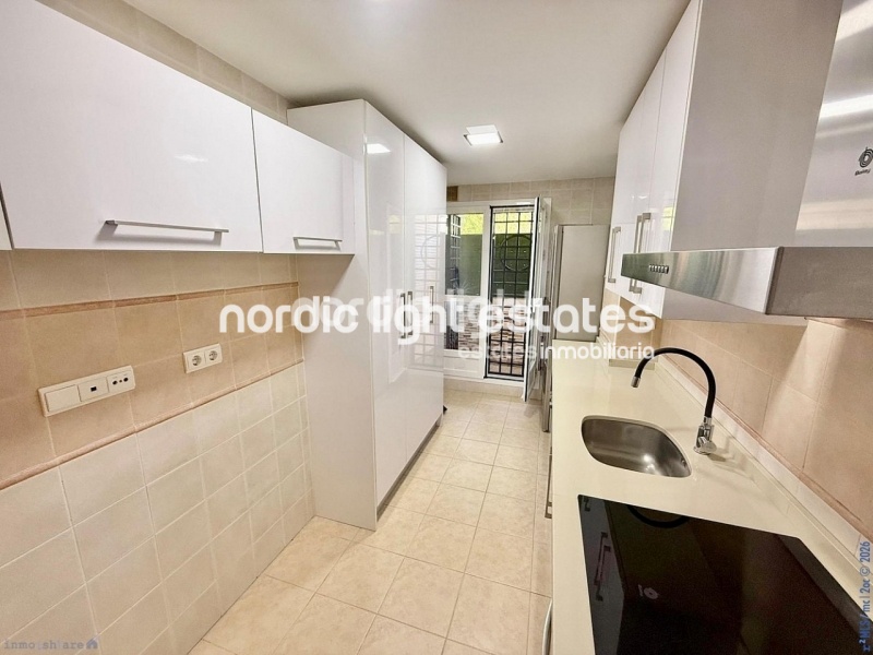 Elegante apartamento de esquina con terraza de 100m2