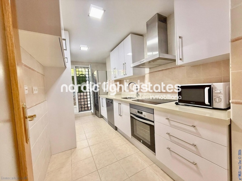 Elegante apartamento de esquina con terraza de 100m2