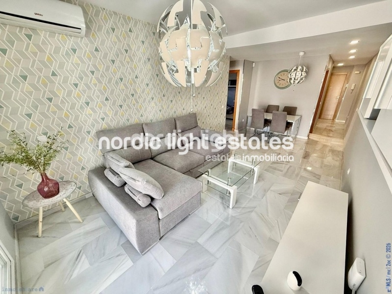 Elegante apartamento de esquina con terraza de 100m2