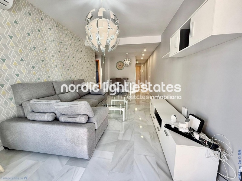 Elegante apartamento de esquina con terraza de 100m2