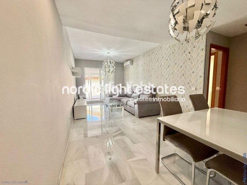 Elegante apartamento de esquina con terraza de 100m2