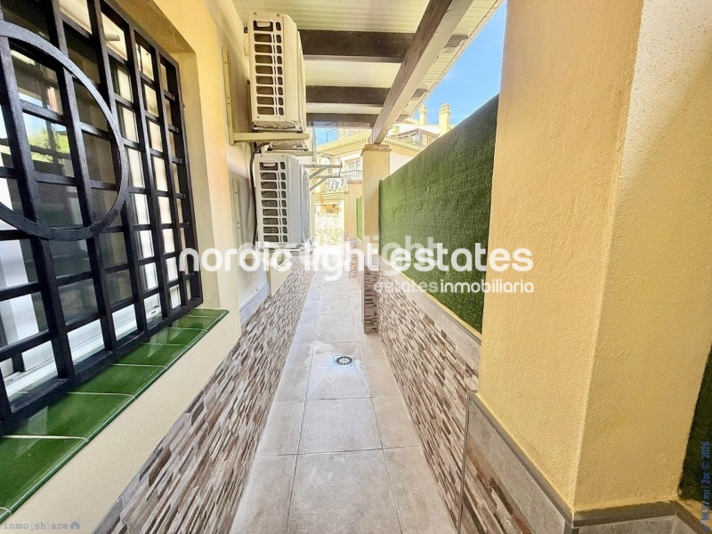 Elegante apartamento de esquina con terraza de 100m2