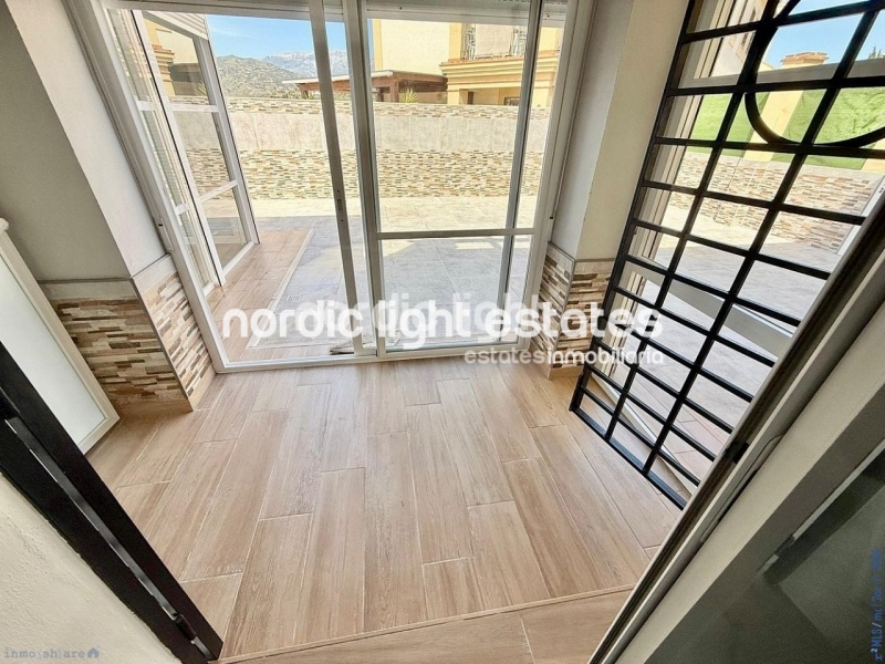 Elegante apartamento de esquina con terraza de 100m2