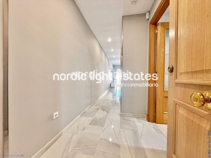 Elegante apartamento de esquina con terraza de 100m2