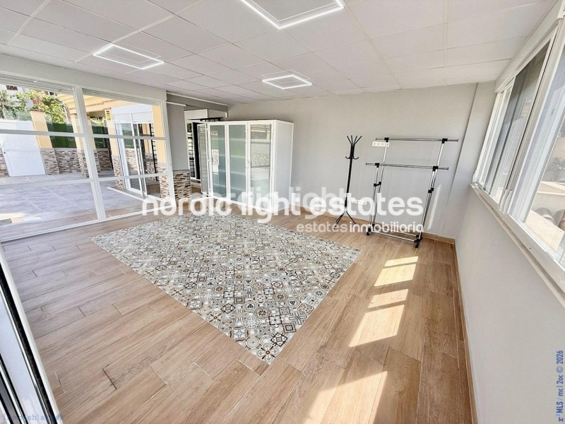 Elegante apartamento de esquina con terraza de 100m2