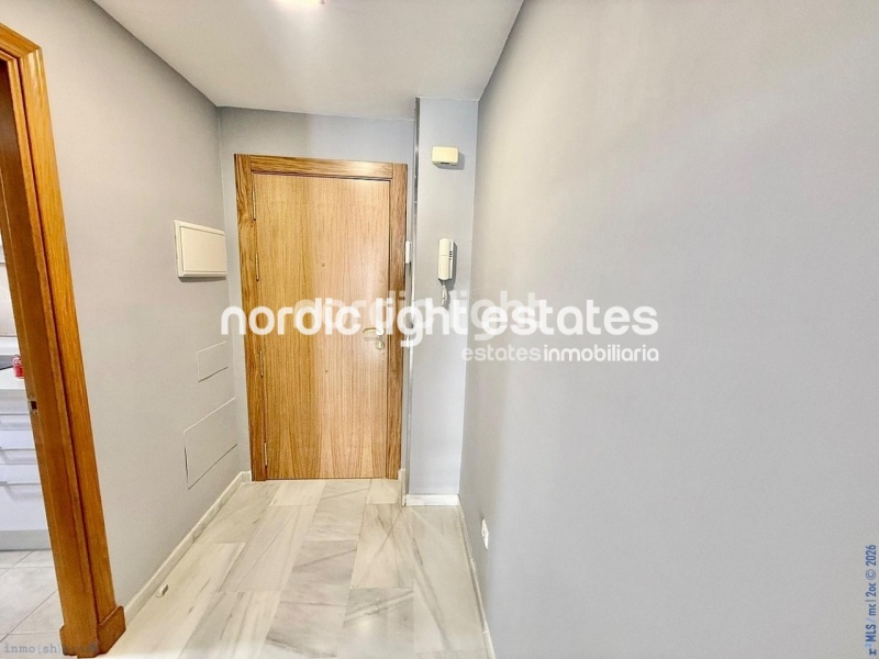 Elegante apartamento de esquina con terraza de 100m2