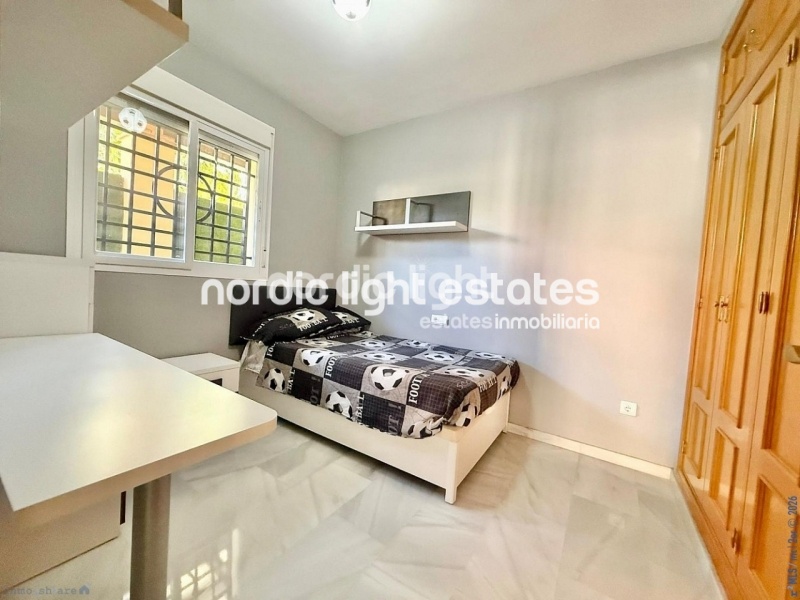 Elegante apartamento de esquina con terraza de 100m2