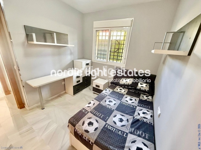 Elegante apartamento de esquina con terraza de 100m2