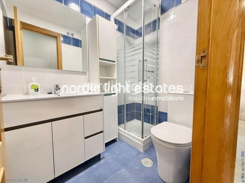 Elegante apartamento de esquina con terraza de 100m2