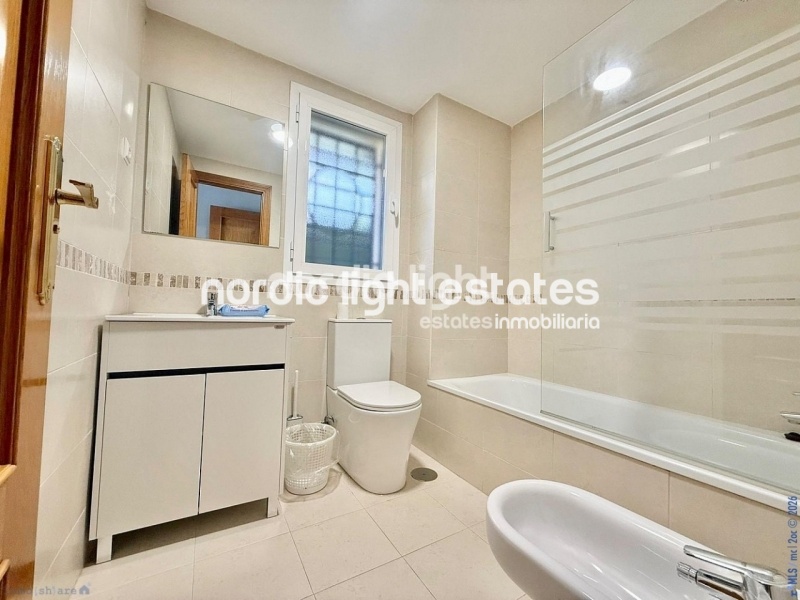 Elegante apartamento de esquina con terraza de 100m2